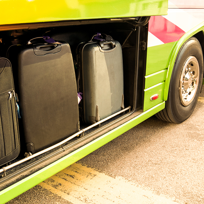 Undercarriage of a bus full of luggage